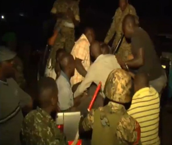 Military seen dragging suspects out of their hideout