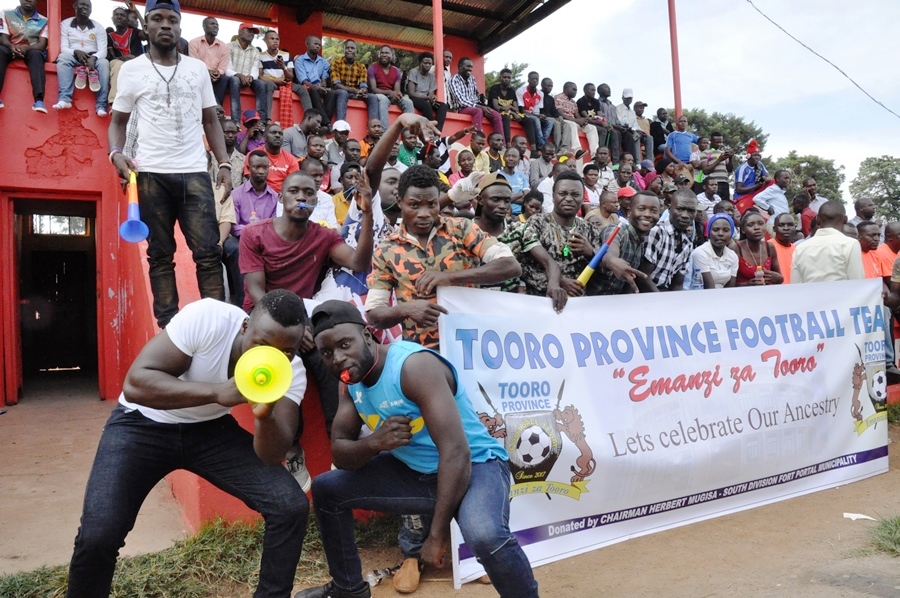 Excited Tooro fans at the Kakyeeka stadium