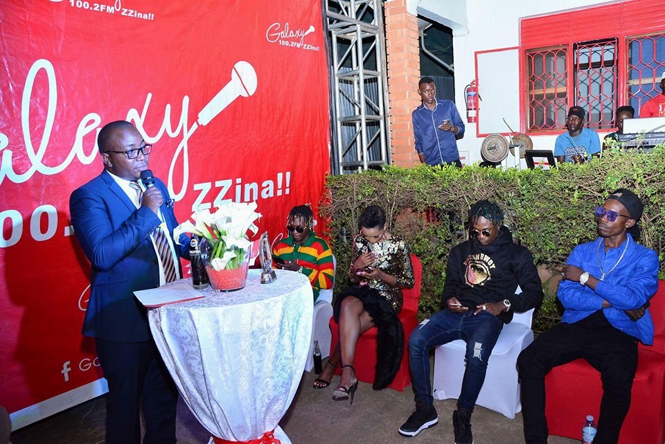 Artistes at the Zzina Awards launch; Beenie Gunter, Spice Diana, Fik Fameica and Topic Kasente listen in to Galaxy FM MD Dr. Innocent Nahabwe unveil the nominees at Galaxy FM 100.2 premises in Kansanga (Photos by Ramol)