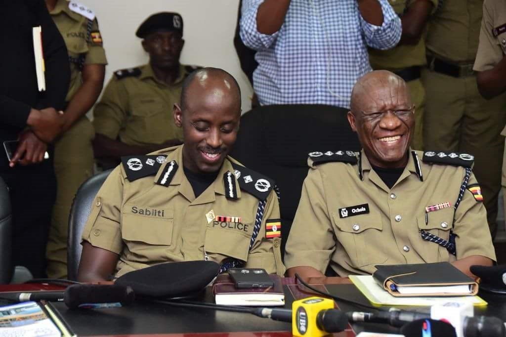 Police Chief Ochola with his deputy Sabiti Mzee at their ushering in ceremony at police headquarters
