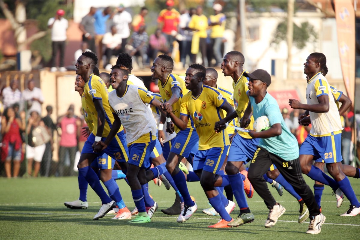 Kizza at the forefront celebrates with teammates after win against Ethiopia giants St. George at Star Times Stadium Lugogo
