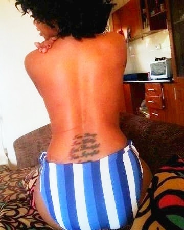 Sheebah showing off her tattoos