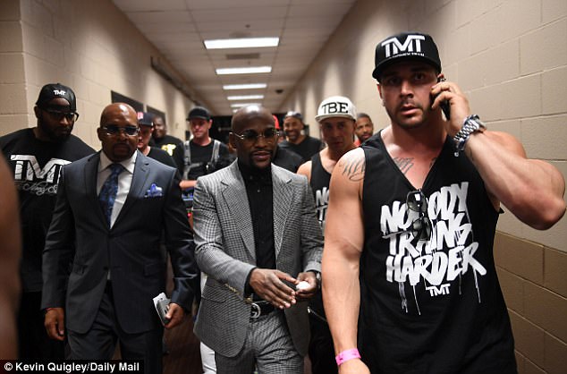 Mayweather with his bodyguards 