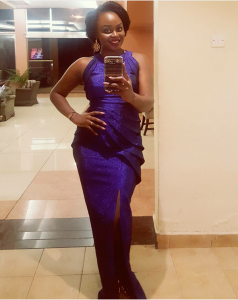 Rema looked beautiful in the dark blue dress for her big night gig