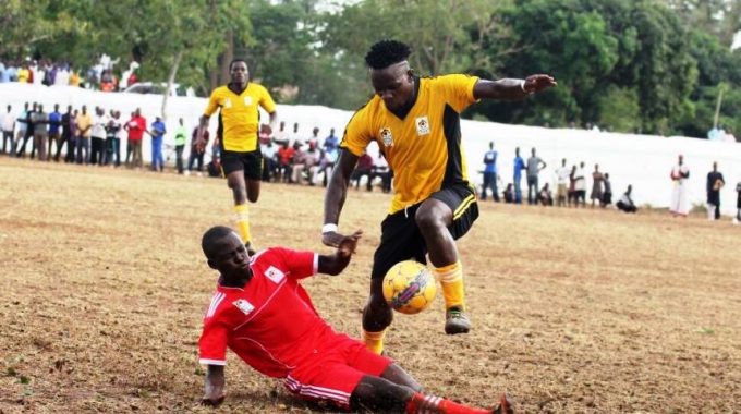 Kampala Province’s Yayo Lutimba attempts to dribble past a Bukedi opponent