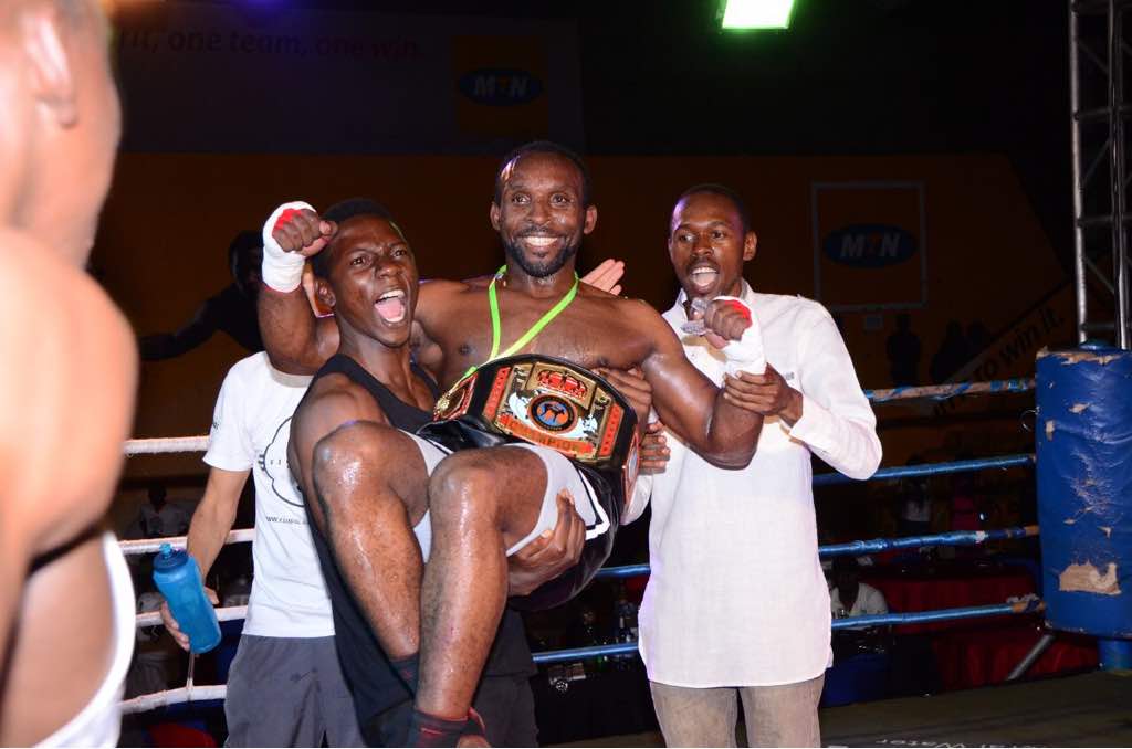 Matsiko celebrating after winning (WKF) International title in K1 Light middle weight against Khalil Bamermech from UAE in 2015.