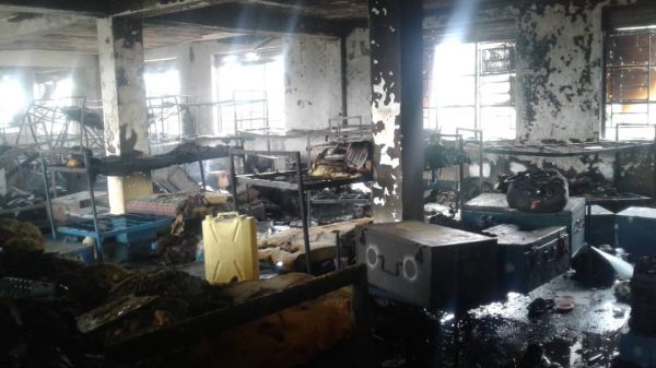 Student dies after former schoolmates set two dormitories ablaze